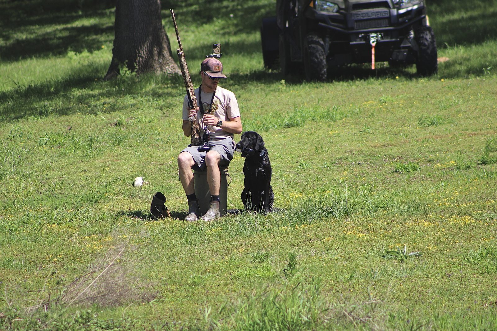 Devin and dogs on the open Kansas prairie